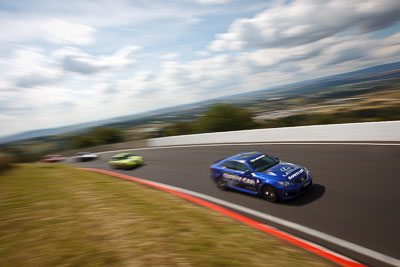 3-April-2010;Australia;Bathurst;FOSC;Festival-of-Sporting-Cars;Lexus-IS-F;Mt-Panorama;NSW;New-South-Wales;auto;clouds;motion-blur;motorsport;movement;officials;racing;sky;speed;wide-angle