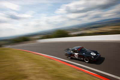 114;1975-Porsche-911-Carrera;3-April-2010;Australia;Bathurst;Chris-Wilson;FOSC;Festival-of-Sporting-Cars;Historic-Sports-Cars;Mt-Panorama;NSW;New-South-Wales;RS2700;auto;classic;clouds;motion-blur;motorsport;movement;racing;sky;speed;vintage;wide-angle