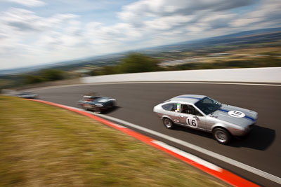 16;1976-Alfa-Romeo-Alfetta-GT-Coupe;3-April-2010;Australia;Bathurst;FOSC;Festival-of-Sporting-Cars;Historic-Sports-Cars;John-Pucak;Mt-Panorama;NSW;New-South-Wales;auto;classic;clouds;motion-blur;motorsport;racing;sky;vintage;wide-angle