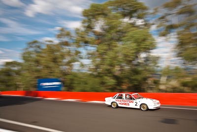 2;1985-Holden-Commodore-VK;3-April-2010;Australia;Bathurst;FOSC;Festival-of-Sporting-Cars;Jamie-McDonald;Mt-Panorama;NSW;New-South-Wales;auto;motion-blur;motorsport;racing;trees;wide-angle