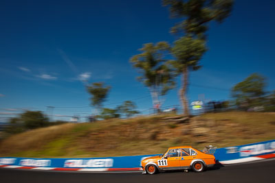 111;1977-Ford-Escort;4-April-2010;Australia;Bathurst;FOSC;Festival-of-Sporting-Cars;Lawrie-Watson;Mt-Panorama;NSW;New-South-Wales;Regularity;auto;clouds;motion-blur;motorsport;racing;sky;wide-angle