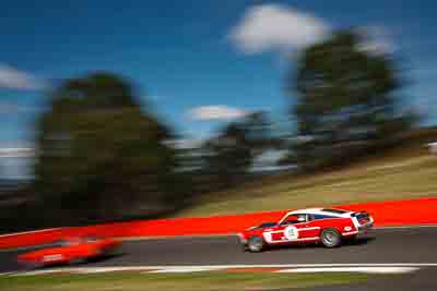 15;1969-Ford-Mustang;4-April-2010;Australia;Bathurst;Darryl-Hansen;FOSC;Festival-of-Sporting-Cars;Historic-Touring-Cars;Mt-Panorama;NSW;New-South-Wales;auto;classic;motion-blur;motorsport;movement;racing;sky;speed;trees;vintage;wide-angle