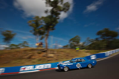 88;1964-Ford-Mustang;4-April-2010;Australia;Bathurst;FOSC;Festival-of-Sporting-Cars;Frank-Viskovich;Historic-Touring-Cars;Mt-Panorama;NSW;New-South-Wales;auto;classic;clouds;motion-blur;motorsport;racing;sky;vintage;wide-angle