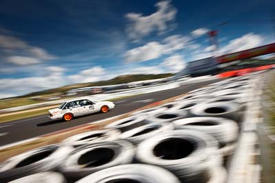 110;4-April-2010;Australia;Bathurst;FOSC;Festival-of-Sporting-Cars;Holden-Commodore-VL;Kim-McConchie;Mt-Panorama;NSW;New-South-Wales;Regularity;auto;clouds;motion-blur;motorsport;racing;sky;wide-angle