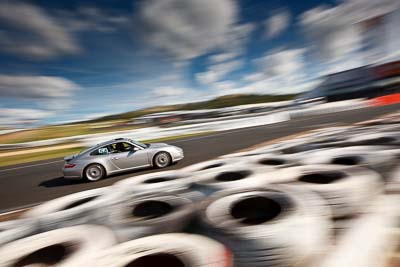 54;2006-Porsche-911-Carrera-S;4-April-2010;Australia;Bathurst;FOSC;Festival-of-Sporting-Cars;John-Beurle;Mt-Panorama;NSW;New-South-Wales;Regularity;auto;clouds;motion-blur;motorsport;racing;sky;wide-angle