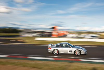 919;2007-Porsche-911-GT3;4-April-2010;Australia;Bathurst;FOSC;Festival-of-Sporting-Cars;Marc-Kovacic;Mt-Panorama;NSW;New-South-Wales;Regularity;auto;clouds;motion-blur;motorsport;racing;sky;wide-angle