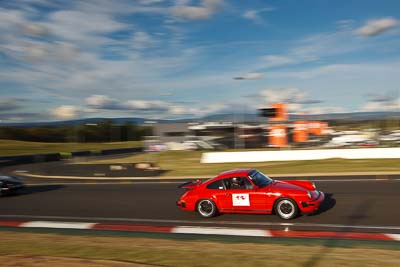 37;1976-Porsche-911-Carrera;4-April-2010;Australia;Bathurst;FOSC;Festival-of-Sporting-Cars;Ian-North;Mt-Panorama;NSW;New-South-Wales;Regularity;auto;clouds;motion-blur;motorsport;racing;sky;wide-angle