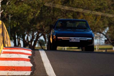 214;1982-Fiat-X19;5-April-2010;Australia;Bathurst;FOSC;Festival-of-Sporting-Cars;Gordon-Dowthwaite;Mt-Panorama;NSW;New-South-Wales;Regularity;WFI884;auto;motorsport;racing;super-telephoto