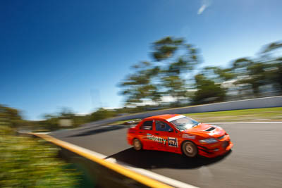 167;2001-Mitsubishi-Lancer-Evolution-VII;5-April-2010;Australia;Bathurst;FOSC;Festival-of-Sporting-Cars;Mt-Panorama;NSW;New-South-Wales;Regularity;Steve-Haynes;Topshot;YGA59T;auto;motion-blur;motorsport;racing;sky;wide-angle