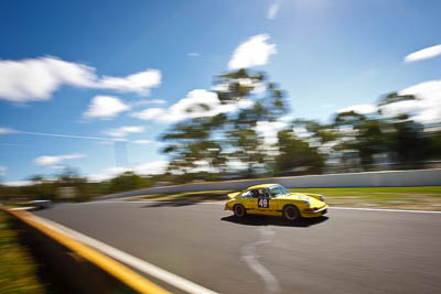 49;1973-Porsche-911-Carrera-RS;5-April-2010;Australia;Bathurst;FOSC;Festival-of-Sporting-Cars;Lloyd-Hughes;Mt-Panorama;NSW;New-South-Wales;Regularity;auto;clouds;motion-blur;motorsport;racing;sky;wide-angle