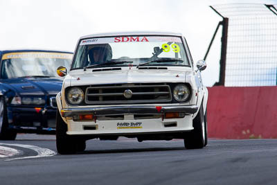 99;1972-Datsun-1200-Coupe;5-April-2010;Australia;Bathurst;FOSC;Festival-of-Sporting-Cars;Mt-Panorama;NSW;New-South-Wales;Paul-Wyatt;Regularity;auto;motorsport;racing;super-telephoto