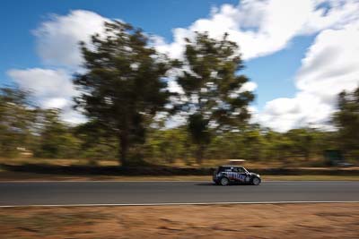 39;30-May-2010;Australia;Mini-Cooper-S;Morgan-Park-Raceway;QLD;Queensland;Roger-Spencer;Sports-Sedans;Warwick;auto;clouds;motion-blur;motorsport;racing;sky;wide-angle