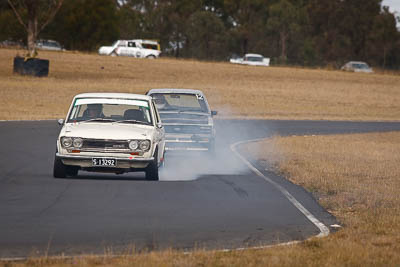 100;1971-Datsun-1600;24-July-2010;Australia;Darren-Ferguson;Morgan-Park-Raceway;QLD;Queensland;Warwick;auto;lock‒up;motorsport;racing;smoke;super-telephoto