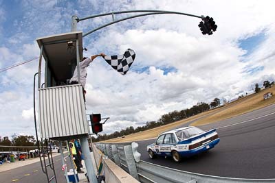 98;1985-Holden-Commodore-VK;25-July-2010;Australia;Group-A;Historic-Touring-Cars;Morgan-Park-Raceway;Peter-Woods;QLD;Queensland;Warwick;auto;chequered-flag;classic;clouds;finish;fisheye;motorsport;racing;sky;vintage