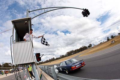 51;1981-Volvo-240T;25-July-2010;Australia;Group-A;Historic-Touring-Cars;Morgan-Park-Raceway;QLD;Queensland;Richard-Prince;Warwick;auto;chequered-flag;classic;clouds;finish;fisheye;motorsport;racing;sky;vintage