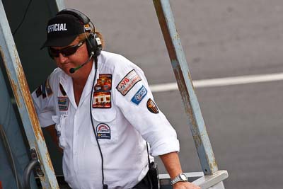 25-July-2010;Australia;Morgan-Park-Raceway;QLD;Queensland;Warwick;atmosphere;auto;flag-marshal;motorsport;official;paddock;portrait;racing;super-telephoto