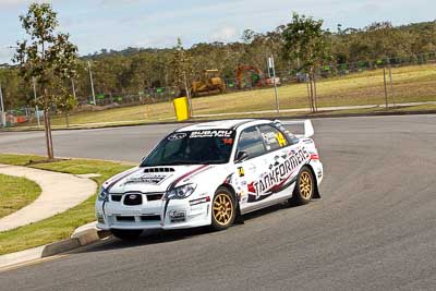 14;30-July-2010;ARC;Australia;Australian-Rally-Championship;Caloundra;QLD;Queensland;Simon-Evans;Subaru-Impreza-WRX;Sue-Evans;Sunshine-Coast;auto;motorsport;racing;shakedown;telephoto