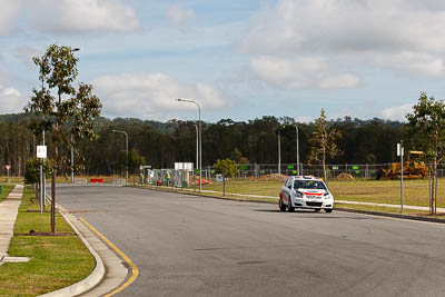 22;30-July-2010;ARC;Australia;Australian-Rally-Championship;Caloundra;Margot-Knowles;QLD;Queensland;Simon-Knowles;Sunshine-Coast;Toyota-Corolla-Sportivo;auto;motorsport;racing;shakedown;telephoto