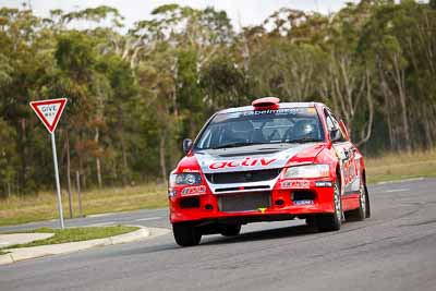 16;30-July-2010;ARC;Activ-Rallysport;Australia;Australian-Rally-Championship;Caloundra;Evo-9;Justin-Dowel;Matt-Lee;Mitsubishi-Lancer;Mitsubishi-Lancer-Evolution-IX;QLD;Queensland;Sunshine-Coast;auto;motorsport;racing;shakedown;telephoto