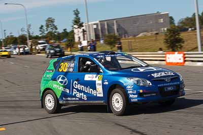 30;30-July-2010;ARC;Australia;Australian-Rally-Championship;Caloundra;Harvey-Smith;Hyundai-i30-CRDi;Mick-Gillett;QLD;Queensland;Sunshine-Coast;auto;motorsport;racing;shakedown;telephoto