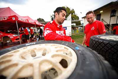 1-August-2010;APRC;Asia-Pacific-Rally-Championship;Australia;Gaurav-Gill;Imbil;QLD;Queensland;Sunshine-Coast;auto;motorsport;portrait;racing;service-centre;service-park;tyres;wide-angle