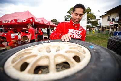 1-August-2010;APRC;Asia-Pacific-Rally-Championship;Australia;Gaurav-Gill;Imbil;QLD;Queensland;Sunshine-Coast;Topshot;auto;motorsport;portrait;racing;service-centre;service-park;tyres;wide-angle