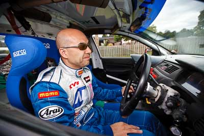1-August-2010;APRC;Asia-Pacific-Rally-Championship;Atsushi-Masumura;Australia;Imbil;QLD;Queensland;Sunshine-Coast;auto;motorsport;portrait;racing;service-centre;service-park;wide-angle