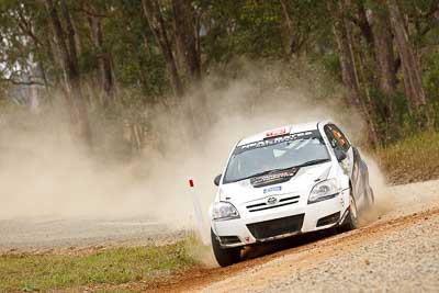 15;1-August-2010;ARC;Australia;Australian-Rally-Championship;Imbil;QLD;Queensland;Rebecca-Smart;Ryan-Smart;Sunshine-Coast;Toyota-Corolla-Sportivo;auto;motorsport;racing;telephoto