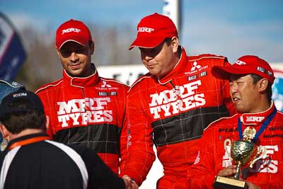 1-August-2010;APRC;Asia-Pacific-Rally-Championship;Australia;Glen-Macneall;Imbil;QLD;Queensland;Sunshine-Coast;auto;celebration;motorsport;official-finish;podium;portrait;racing;telephoto