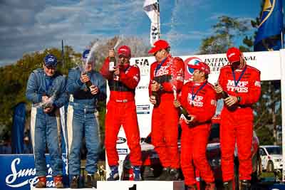 1-August-2010;APRC;Asia-Pacific-Rally-Championship;Australia;Chris-Murphy;Gaurav-Gill;Glen-Macneall;Glen-Raymond;Imbil;Katsu-Taguchi;Matt-Raymond;QLD;Queensland;Sunshine-Coast;auto;celebration;motorsport;official-finish;podium;portrait;racing;telephoto