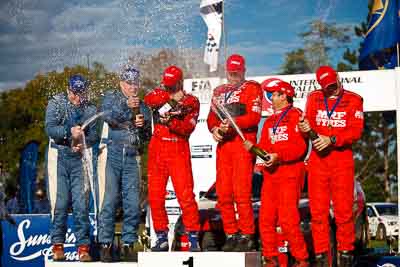 1-August-2010;APRC;Asia-Pacific-Rally-Championship;Australia;Chris-Murphy;Gaurav-Gill;Glen-Macneall;Glen-Raymond;Imbil;Katsu-Taguchi;Matt-Raymond;QLD;Queensland;Sunshine-Coast;Topshot;auto;celebration;motorsport;official-finish;podium;portrait;racing;telephoto