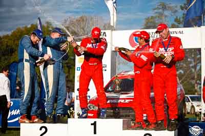 1-August-2010;APRC;Asia-Pacific-Rally-Championship;Australia;Chris-Murphy;Gaurav-Gill;Glen-Raymond;Imbil;Katsu-Taguchi;Matt-Raymond;QLD;Queensland;Sunshine-Coast;auto;celebration;motorsport;official-finish;podium;portrait;racing;telephoto