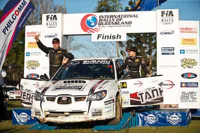 14;1-August-2010;ARC;Australia;Australian-Rally-Championship;Imbil;QLD;Queensland;Simon-Evans;Subaru-Impreza-WRX;Sue-Evans;Sunshine-Coast;auto;celebration;motorsport;official-finish;podium;portrait;racing;telephoto