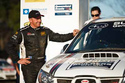 1-August-2010;ARC;Australia;Australian-Rally-Championship;Imbil;QLD;Queensland;Simon-Evans;Sunshine-Coast;auto;celebration;motorsport;official-finish;podium;portrait;racing;telephoto