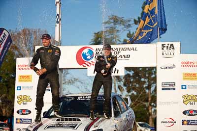 1-August-2010;ARC;Australia;Australian-Rally-Championship;Imbil;QLD;Queensland;Simon-Evans;Sue-Evans;Sunshine-Coast;auto;celebration;motorsport;official-finish;podium;portrait;racing;telephoto