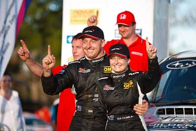 1-August-2010;ARC;Australia;Australian-Rally-Championship;Imbil;QLD;Queensland;Simon-Evans;Sue-Evans;Sunshine-Coast;auto;celebration;motorsport;official-finish;podium;portrait;racing;telephoto