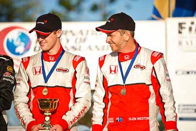 1-August-2010;ARC;Australia;Australian-Rally-Championship;Eli-Evans;Glen-Weston;Imbil;QLD;Queensland;Sunshine-Coast;auto;celebration;motorsport;official-finish;podium;portrait;racing;telephoto