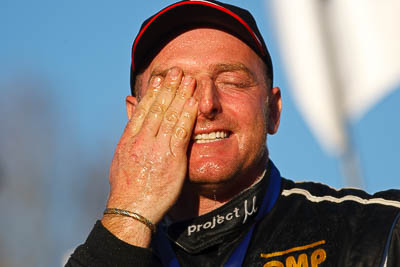 1-August-2010;ARC;Australia;Australian-Rally-Championship;Imbil;QLD;Queensland;Simon-Evans;Sunshine-Coast;Topshot;auto;celebration;motorsport;official-finish;podium;portrait;racing;super-telephoto