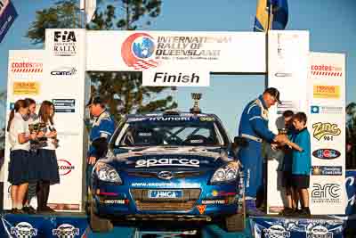 1-August-2010;ARC;Australia;Australian-Rally-Championship;Imbil;Mick-Gillett;QLD;Queensland;Sunshine-Coast;auto;celebration;motorsport;official-finish;podium;racing;telephoto