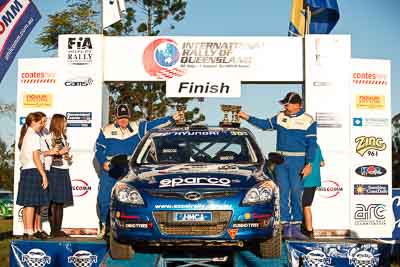 30;1-August-2010;ARC;Australia;Australian-Rally-Championship;Harvey-Smith;Hyundai-i30-CRDi;Imbil;Mick-Gillett;QLD;Queensland;Sunshine-Coast;auto;celebration;motorsport;official-finish;podium;racing;telephoto