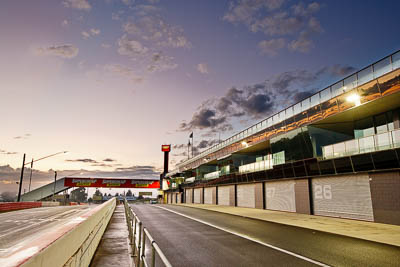 22-April-2011;Australia;Bathurst;Bathurst-Motor-Festival;Mt-Panorama;NSW;New-South-Wales;Topshot;atmosphere;auto;building;clouds;morning;motorsport;pitlane;racing;scenery;sky;wide-angle