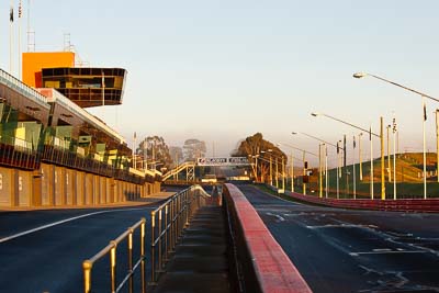 22-April-2011;Australia;Bathurst;Bathurst-Motor-Festival;Mt-Panorama;NSW;New-South-Wales;atmosphere;auto;building;circuit;morning;motorsport;pitlane;racing;scenery