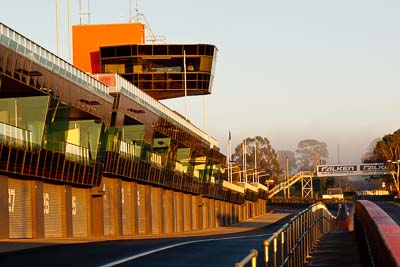 22-April-2011;Australia;Bathurst;Bathurst-Motor-Festival;Mt-Panorama;NSW;New-South-Wales;atmosphere;auto;building;morning;motorsport;pitlane;racing;scenery