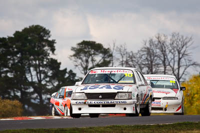 10;10;22-April-2011;Australia;Bathurst;Bathurst-Motor-Festival;Bruce-Panting;Commodore-Cup;Geoff-Cowie;Holden-Commodore-VH;Mt-Panorama;NSW;New-South-Wales;auto;motorsport;racing;super-telephoto