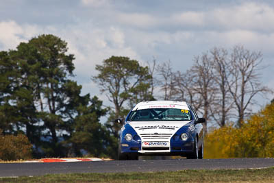 59;22-April-2011;Australia;Bathurst;Bathurst-Motor-Festival;Daniel-Hodge;Ford-Falcon-AU;Mt-Panorama;NSW;New-South-Wales;Saloon-Cars;auto;clouds;motorsport;racing;sky;super-telephoto