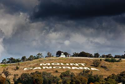 2011-Bathurst-Motor-Festival;22-April-2011;Australia;Bathurst;Bathurst-Motor-Festival;Mt-Panorama;NSW;New-South-Wales;Topshot;atmosphere;auto;clouds;motorsport;mountain;racing;sign;sky