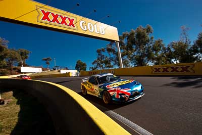 23;23;23-April-2011;Australia;Bathurst;Bathurst-Motor-Festival;Mazda-RX‒7;Mazda-RX7;Michael-Caine;Mt-Panorama;NSW;New-South-Wales;Production-Sports-Cars;auto;motorsport;racing;sky;wide-angle