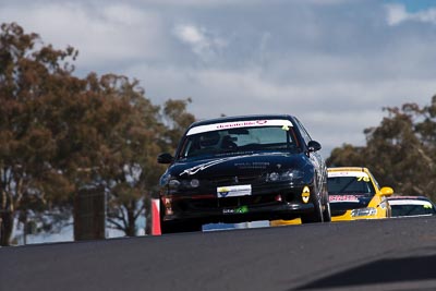 4;23-April-2011;4;Australia;Basil-Stratos;Bathurst;Bathurst-Motor-Festival;Holden-Commodore-VT;Mt-Panorama;NSW;New-South-Wales;Saloon-Cars;auto;clouds;motorsport;racing;sky