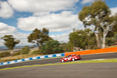 57;23-April-2011;57;Australia;Bathurst;Bathurst-Motor-Festival;Holden-Commodore-VT;Mt-Panorama;NSW;New-South-Wales;Saloon-Cars;Wayne-Patten;auto;clouds;motorsport;racing;sky;wide-angle