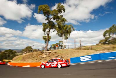 57;23-April-2011;57;Australia;Bathurst;Bathurst-Motor-Festival;Holden-Commodore-VT;Mt-Panorama;NSW;New-South-Wales;Saloon-Cars;Wayne-Patten;auto;clouds;motorsport;racing;sky;wide-angle